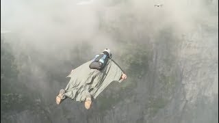 Jump from cliff! Wingsuit flyers put breathtaking show in China