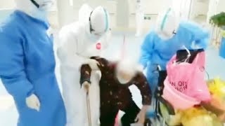 Touching Moment | Recovered coronavirus patient, 86, kneels down to thank medical staff