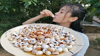 The woman is really bold, 4 pounds of cat's eye snails once under the pot, carrying mustard