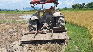 Incredible Kubota M6040SU Tractor Heavy Agriculture Equipment With Rotavator Vs. Muddy Field