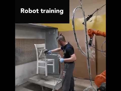 RoboSpray – industrial painting robot taught with a no-code robot training solution