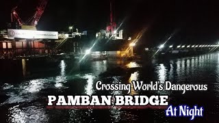 CROSSING PAMBAN BRIDGE AT NIGHT WITH HARSH SEA WAVING WITH THE TRAIN