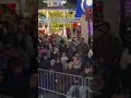 view from the middle of grapevine s parade of lights 2024 christmas capital of texas