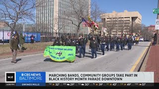 Marching bands, community groups walk in Baltimore parade