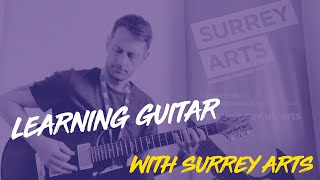 Learning Guitar with Surrey Arts