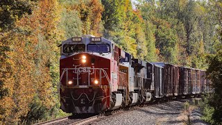 CSX M437 heads west through Chatham Center, New York with CSX 911 leading! 10/2/23