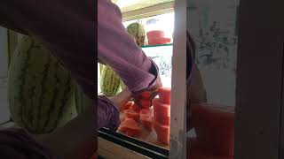 Ice cold water melon ! ...cutting