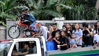 Roasted pigs parade in Filipino village for religious fest