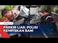 Jelang Tahun Baru, Polres Gianyar Kempiskan Ban Kendaraan yang Parkir Liar di Kawasan Wisata Ubud!