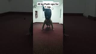 48 kg Push-ups for 1 rep.