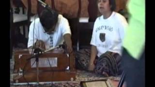 Akshaya Mohanty playing harmonium for the song \