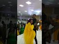 Woman twerking with Rev. Oboufo)/ APC church