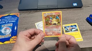 Pulling a Charizard 1999 Base set Pokemon Card from Dollarama 3x premium Pokemon Booster pack.