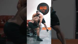 Bodybuilder Wrestling a Powerlifter throwback
