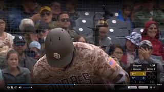 Manny Machado smacks Elias Diaz's glove after Diaz let's Machado know he struck out