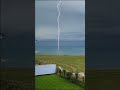 Rare footage shows moment lightning bolt slams into the sea off the English coast | SWNS