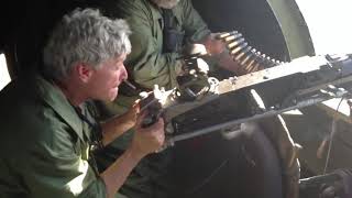 Firing the 50 out of the B-17 waist gunner position