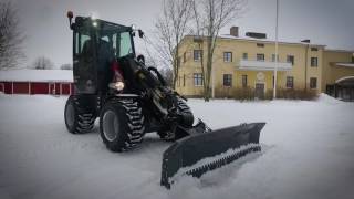 Norcar mini loader performing in winter conditions