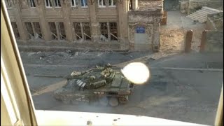 Russian T-72 tank hit by RPG-7 round on the streets of Mariupol