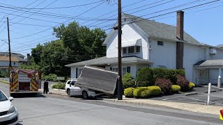 SUV smashes into funeral home canopy