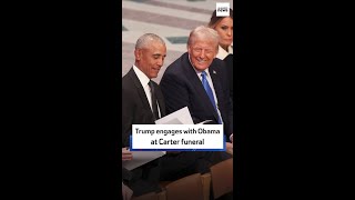 Trump engages with Obama at Carter funeral