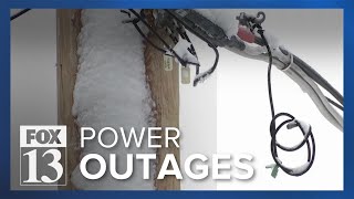 Power outages continue following storm with heavy, dense snow