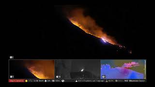 May 21 2922: (night) Small strombolian lava fountains from Mt Etna volcano eruption in Italy