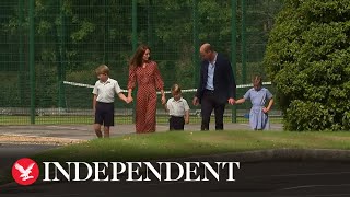 Prince Louis ignores William's offer to hold his hand as he starts first day of school