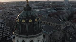 AERIAL: Close Up Drone View of Cathedral Tower Roof in Berlin, Germany at Sunset