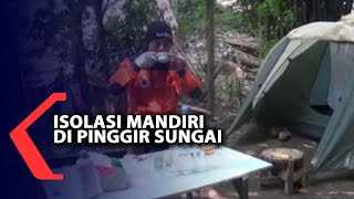 Pemudik Isolasi Mandiri di Pinggir Sungai