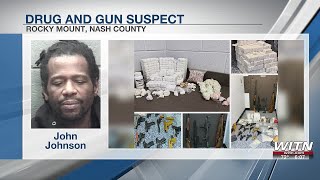 Man arrested in Rocky Mount drug bust, found with 15 firearms, police say