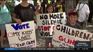 NRA goes ahead with convention in Texas, amid massive protests