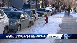 Cars freeze to street on Milwaukee's east side after water main break