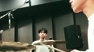 DAY6 Dowoon is practicing drum and Wonpil is dancing to it