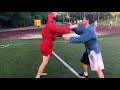 blind sambo demonstration on a football field