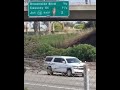 MAN DANCES NAKED IN OCEANSIDE ON FREEWAY SIGN