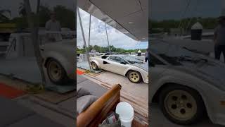 Harrison Crane lifting car onboard a yacht