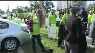 Protesters picket Walmart meeting