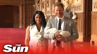 Prince Harry and Meghan Markle show off their new baby Archie to the world