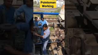 ASSISTANT POINTSMAN ON DUTY WORK IN INDIAN RAILWAY TRAIN SHUNTING