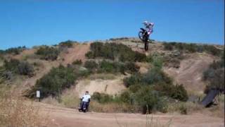 Jeremy Stenberg and Todd Potter jumping over Chris Ackerman