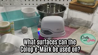 What surfaces can the COLOP e-mark print on?