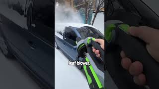 Blowing snow off car