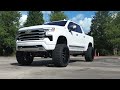 ** brand new 2024 chevy high country on a mcgaughys lift kit **