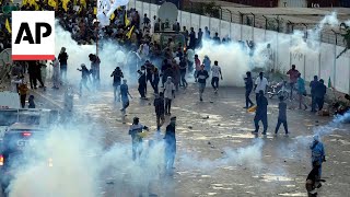 Protesters and police clash in Pakistan over Hezbollah leader's death