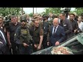 macron draghi scholz and iohannis visit war scarred kyiv suburb irpin afp