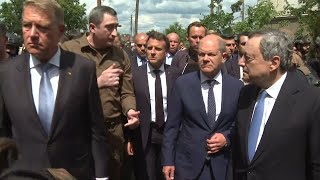 Macron, Draghi, Scholz and Iohannis visit war-scarred Kyiv suburb Irpin | AFP
