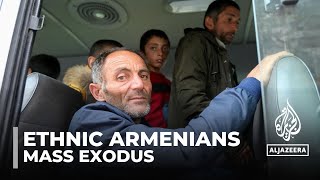 Thousands of Armenians flee Nagorno-Karabakh after latest fighting