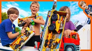 Toy Construction Trucks Caught By Crane Truck and Pretend Play Fishing