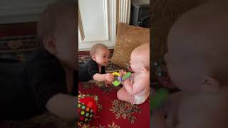 Stasha and Charlie “share” a teether